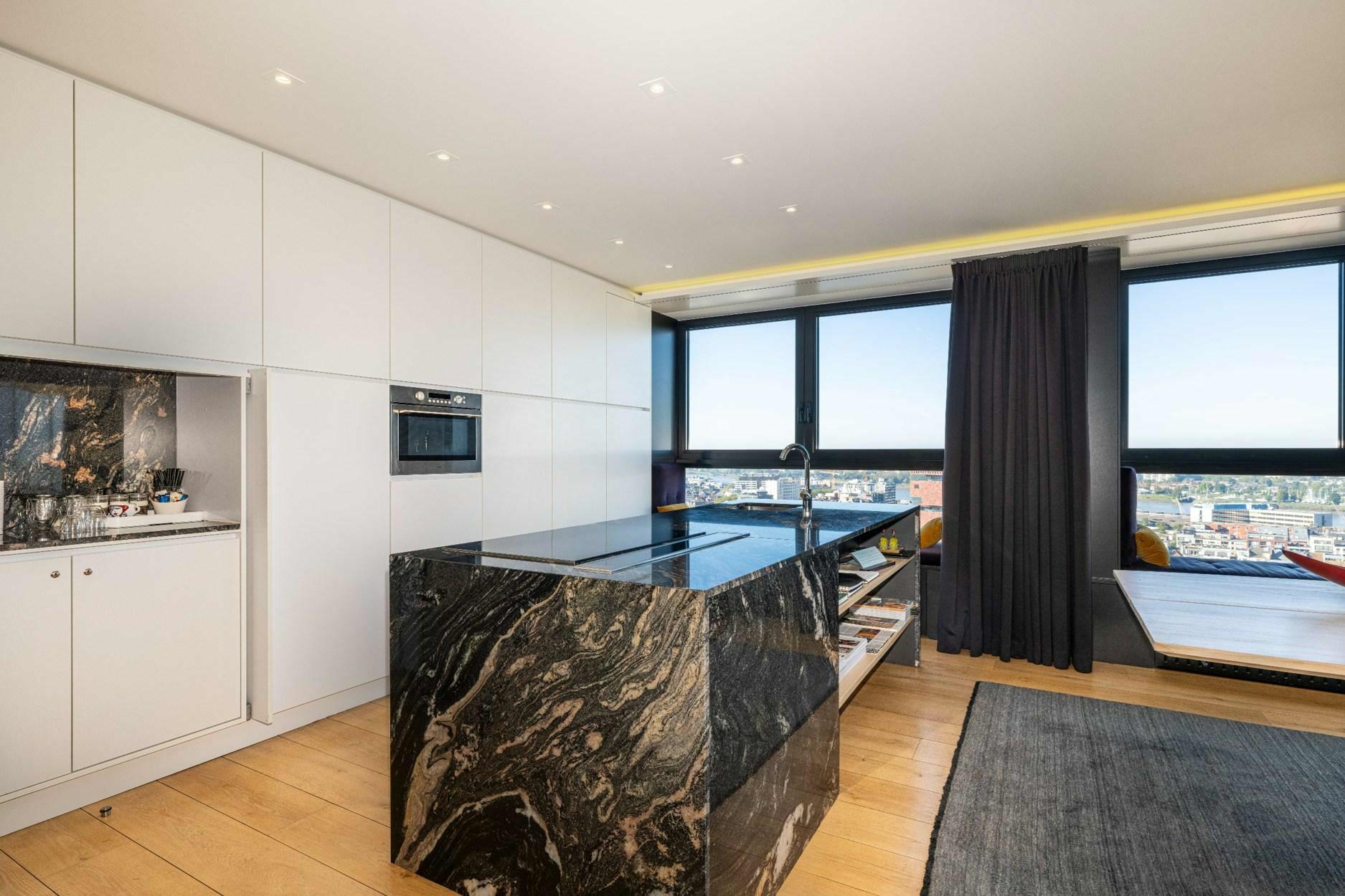 Penthouse met wellness en magnifieke skyline over het gegeerde Eilandje te Antwerpen